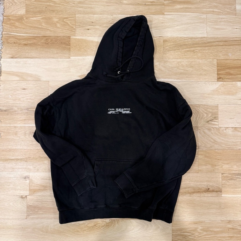 Black Hoodie by Casa Magazines